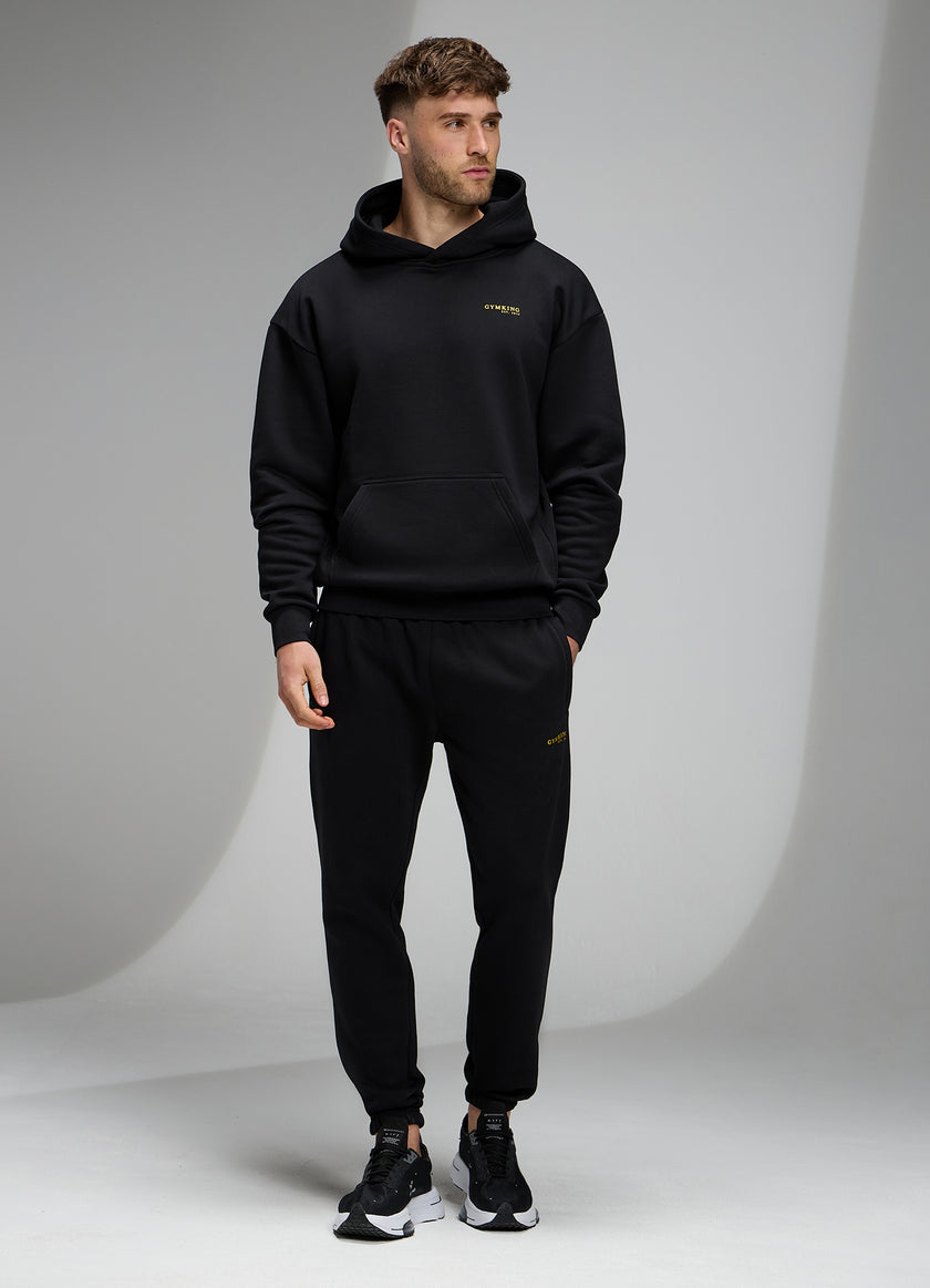 Gym King Established Relaxed Fit Tracksuit - Black/Gold
