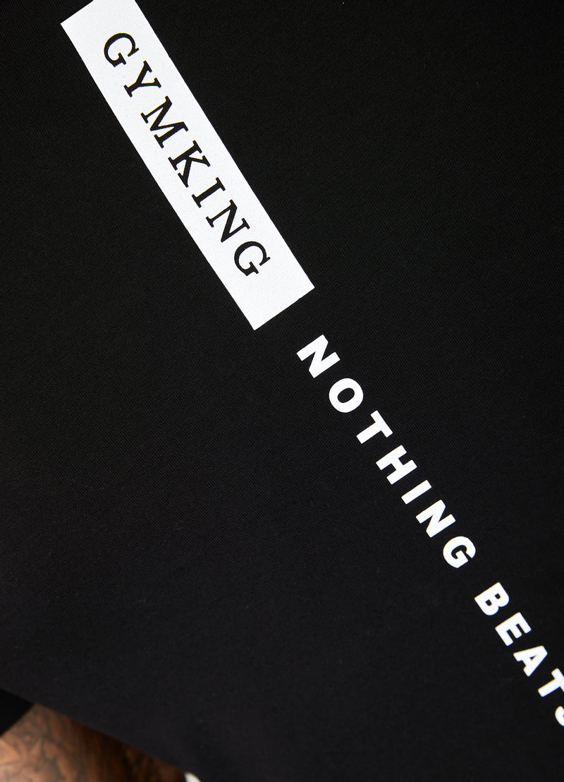 Gym King Nothing Beats Belief Tee - Black/White