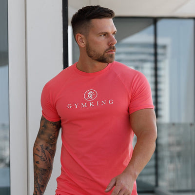 Gym King Pro Jersey Tee Coral men’s soft, breathable relaxed-fit t‑shirt for casual wear and holidays