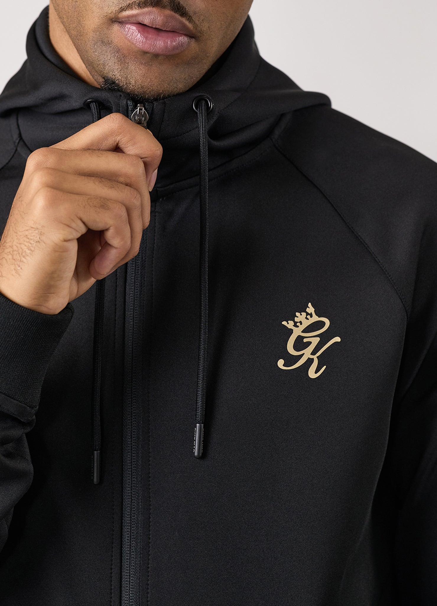 Gym king black and gold tracksuit hotsell